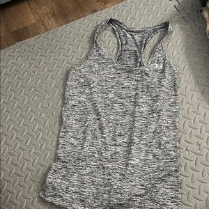 Women’s under Armour black heathered gray  tech tank medium  Please see all pics